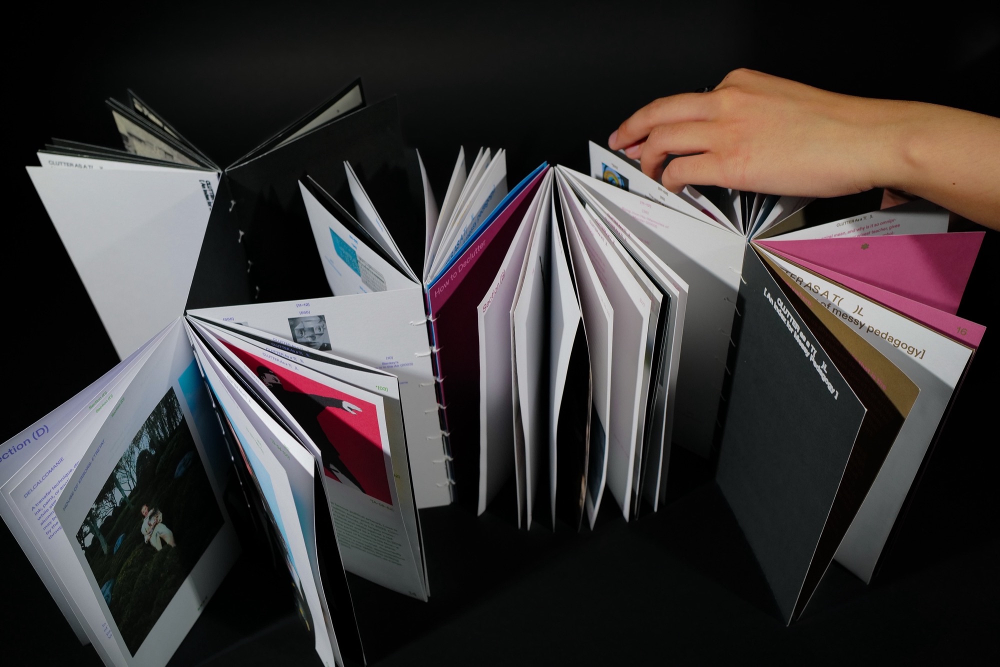 CLUTTER as a T(  )L booklets on black